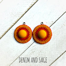 Load image into Gallery viewer, Orange, dark red rust and mustard earrings. Indigenous handmade.
