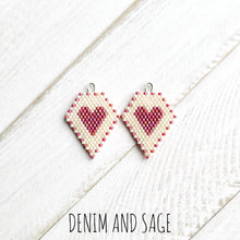 Load image into Gallery viewer, Cream and pink heart beaded earrings. Indigenous handmade.
