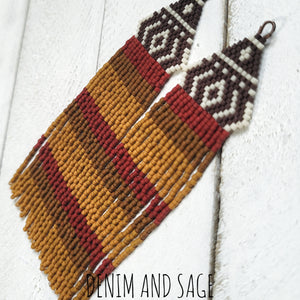 Brown, red and rusty beaded earrings. Indigenous handmade.
