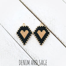 Load image into Gallery viewer, Matte black and gold heart beaded earrings. Indigenous handmade.
