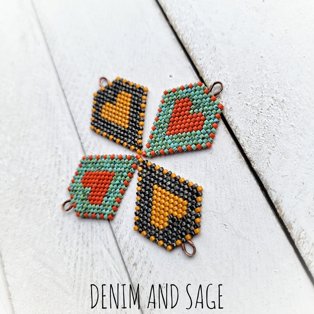 Black picasso and hawthorne heart beaded earrings. Indigenous handmade.
