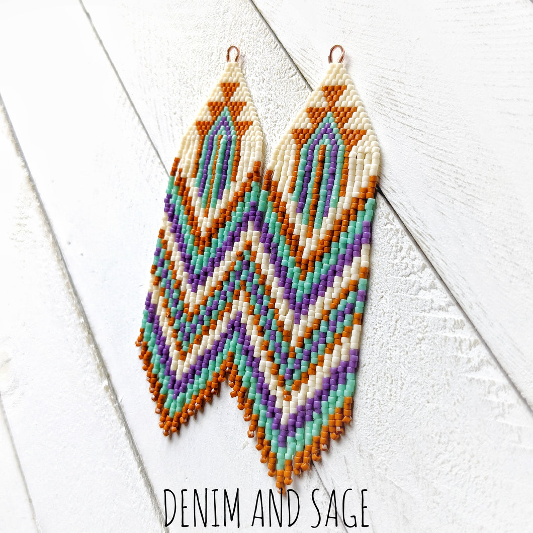 Burnt orange, purple, green and cream beaded fringe earrings. Indigenous handmade.