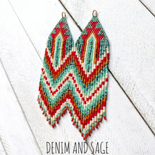 Load image into Gallery viewer, Turquoise, cream, burnt orange and red beaded earrings. Indigenous handmade.
