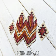 Load image into Gallery viewer, Dark red, burnt orange and cream beaded earrings. Indigenous handmade.
