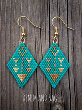 Load image into Gallery viewer, Turquoise and gold arrow earrings. Indigenous handmade.
