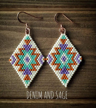 Load image into Gallery viewer, Burnt orange, purple, green and cream beaded earrings. Indigenous handmade.
